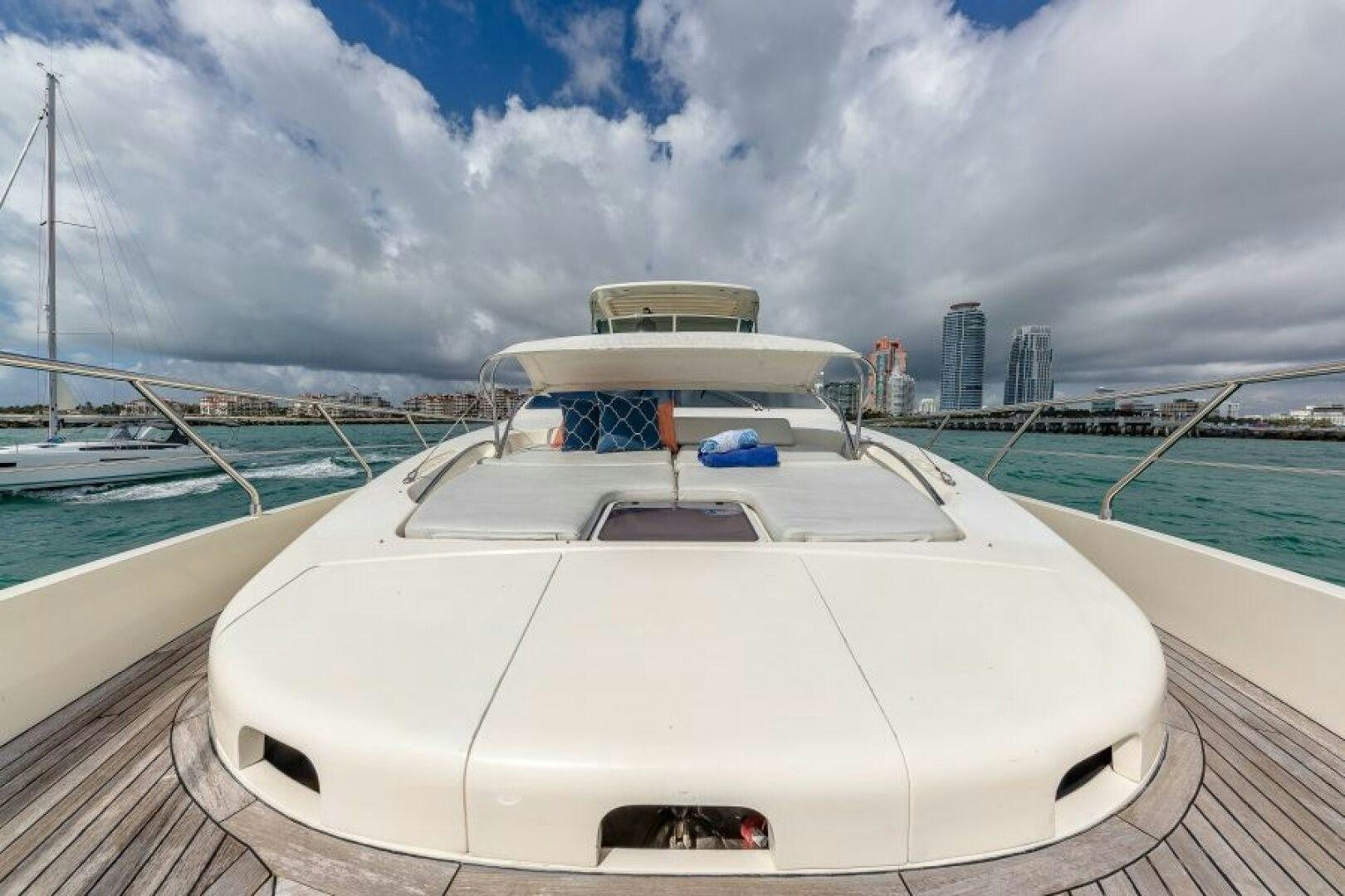 a boat on a deck aboard MINIMAL RISK Yacht for Sale