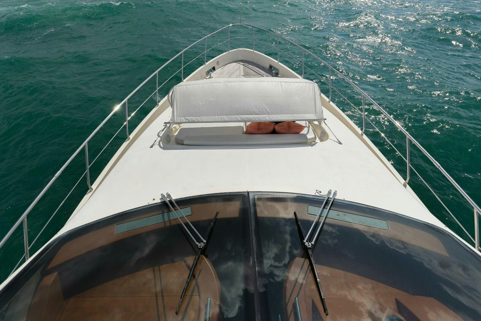 a person in a boat aboard MINIMAL RISK Yacht for Sale