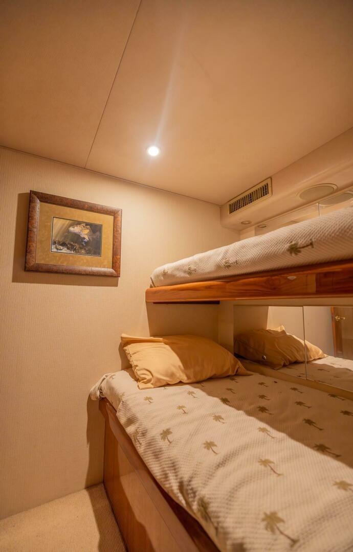 a couple of beds in a hotel room aboard DON'T STOP BELIEVIN Yacht for Sale