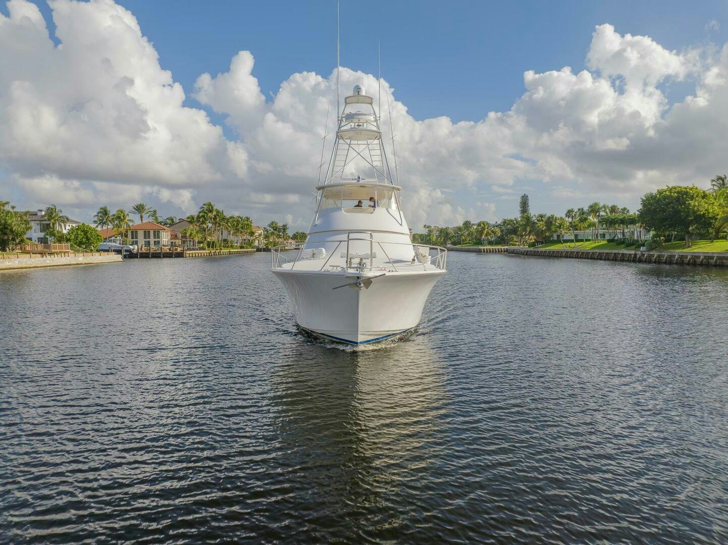 a white boat on the water aboard DON'T STOP BELIEVIN Yacht for Sale