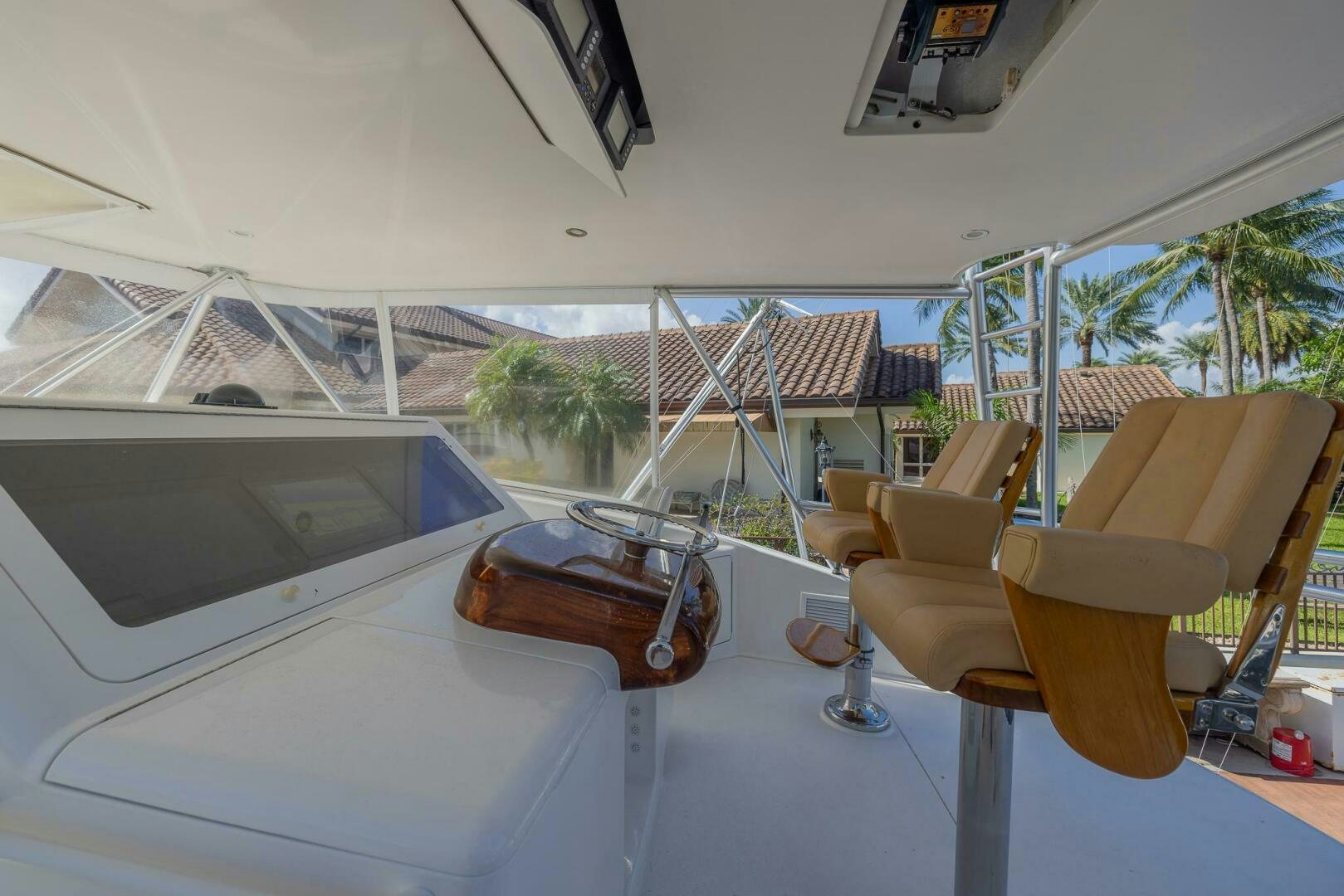 a room with a table and chairs aboard DON'T STOP BELIEVIN Yacht for Sale