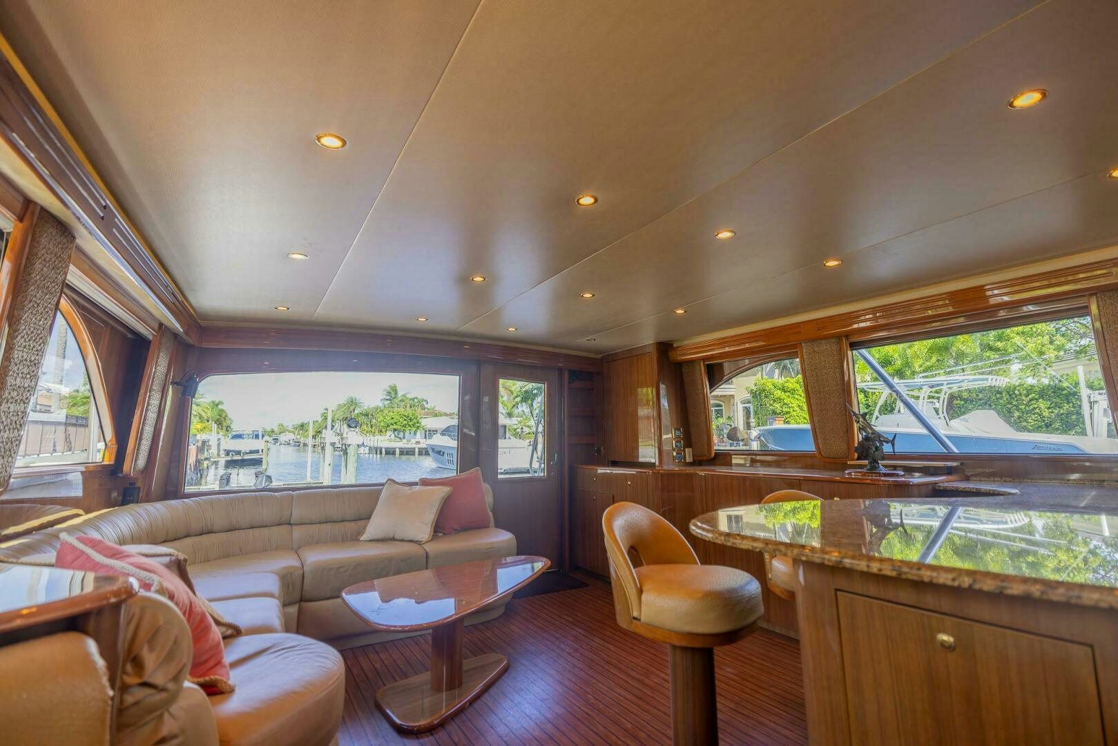 a living room with a large window aboard DON'T STOP BELIEVIN Yacht for Sale