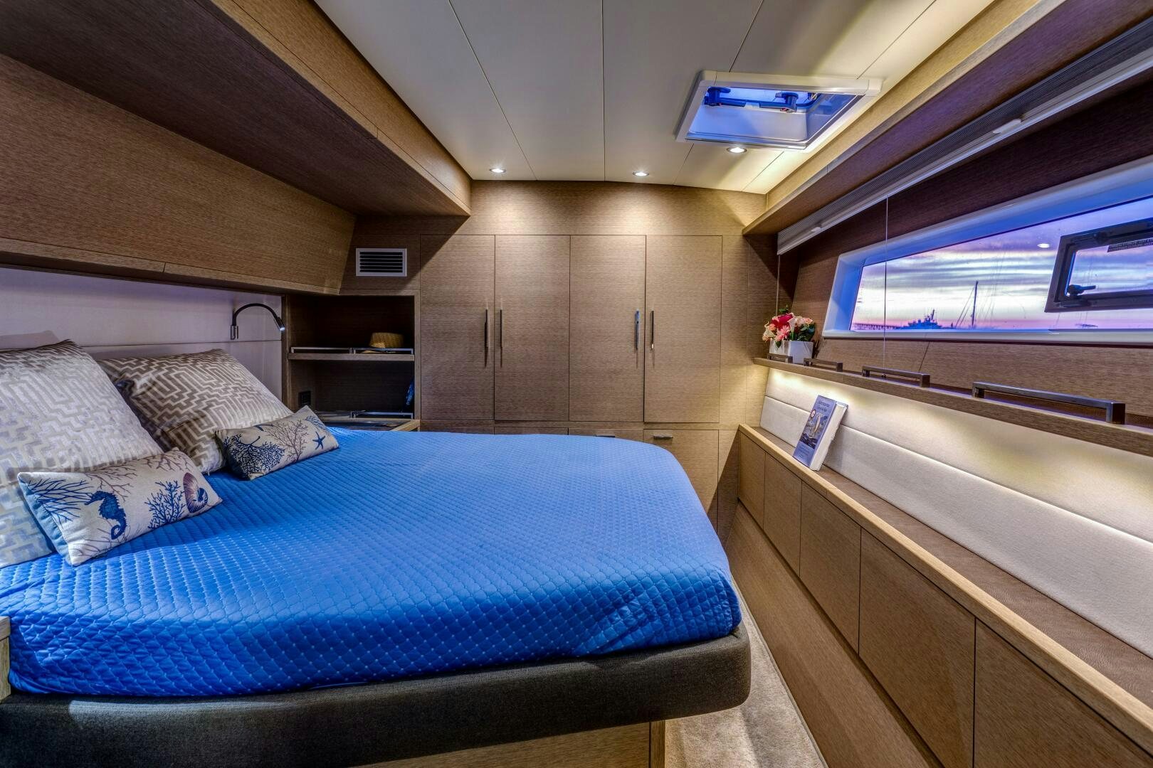 a room with a bed and a tv aboard SECOND WAVE Yacht for Sale