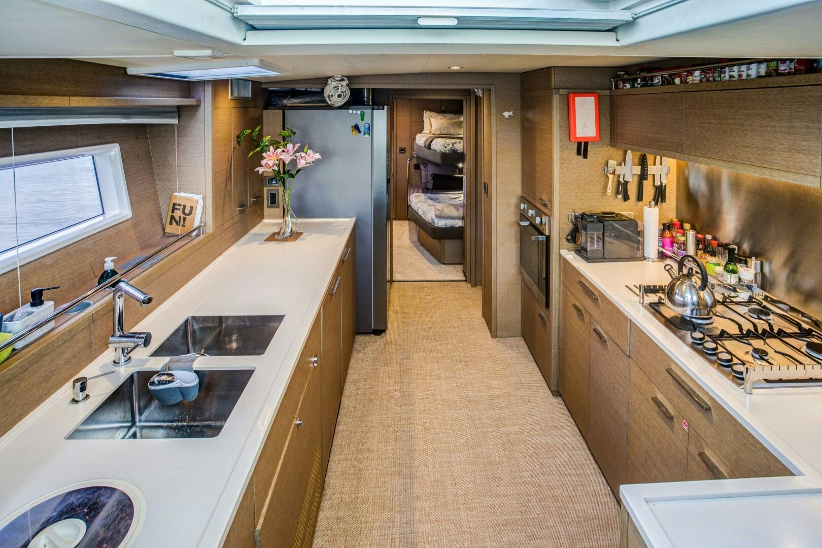a kitchen with a large countertop aboard SECOND WAVE Yacht for Sale