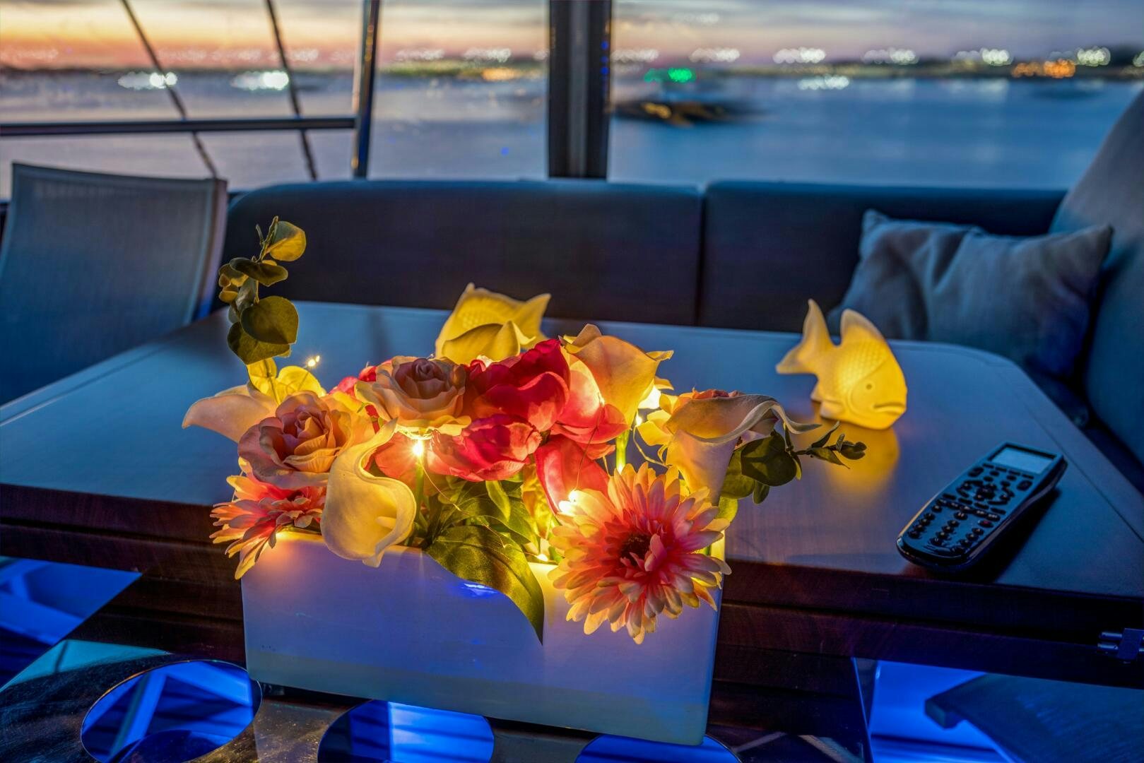 a bouquet of flowers on a table aboard SECOND WAVE Yacht for Sale