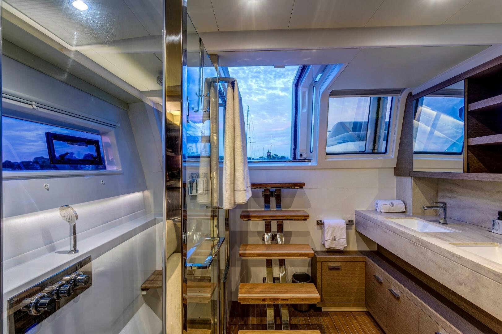 a bathroom with a shower and sink aboard SECOND WAVE Yacht for Sale