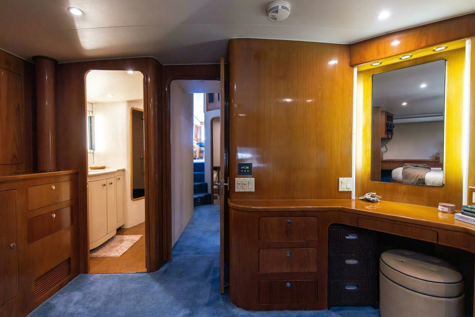 a bathroom with a wood cabinet aboard DIXIE Yacht for Sale