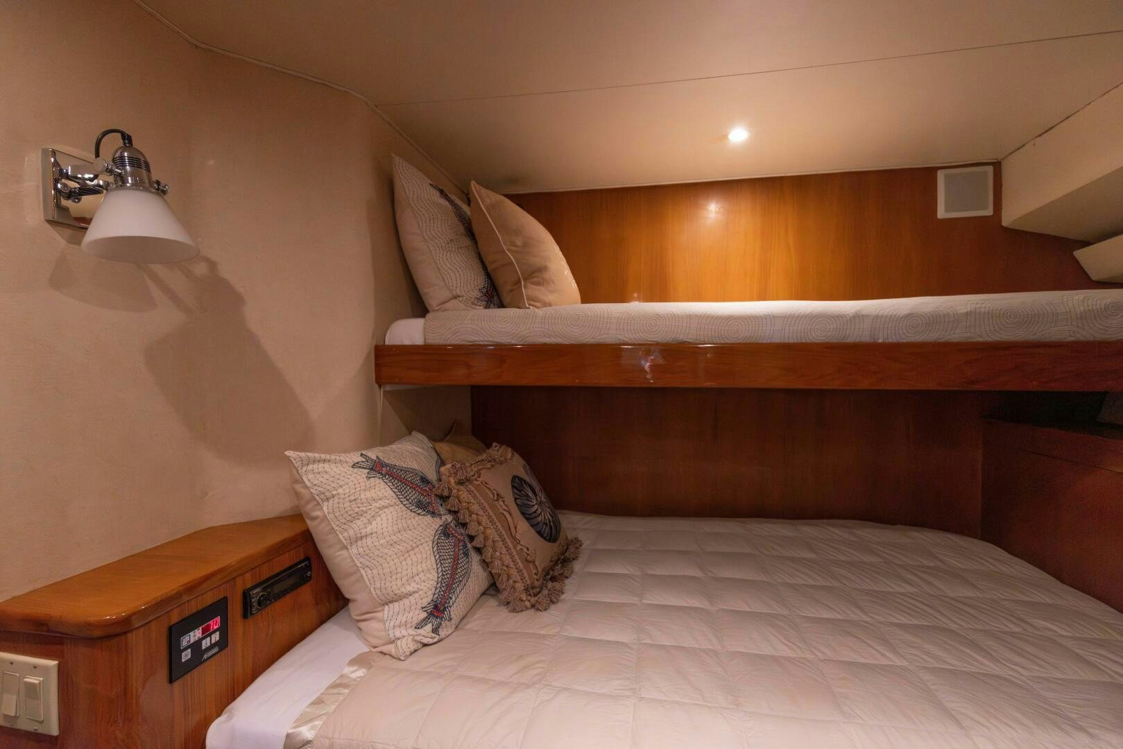a bed with pillows aboard DIXIE Yacht for Sale