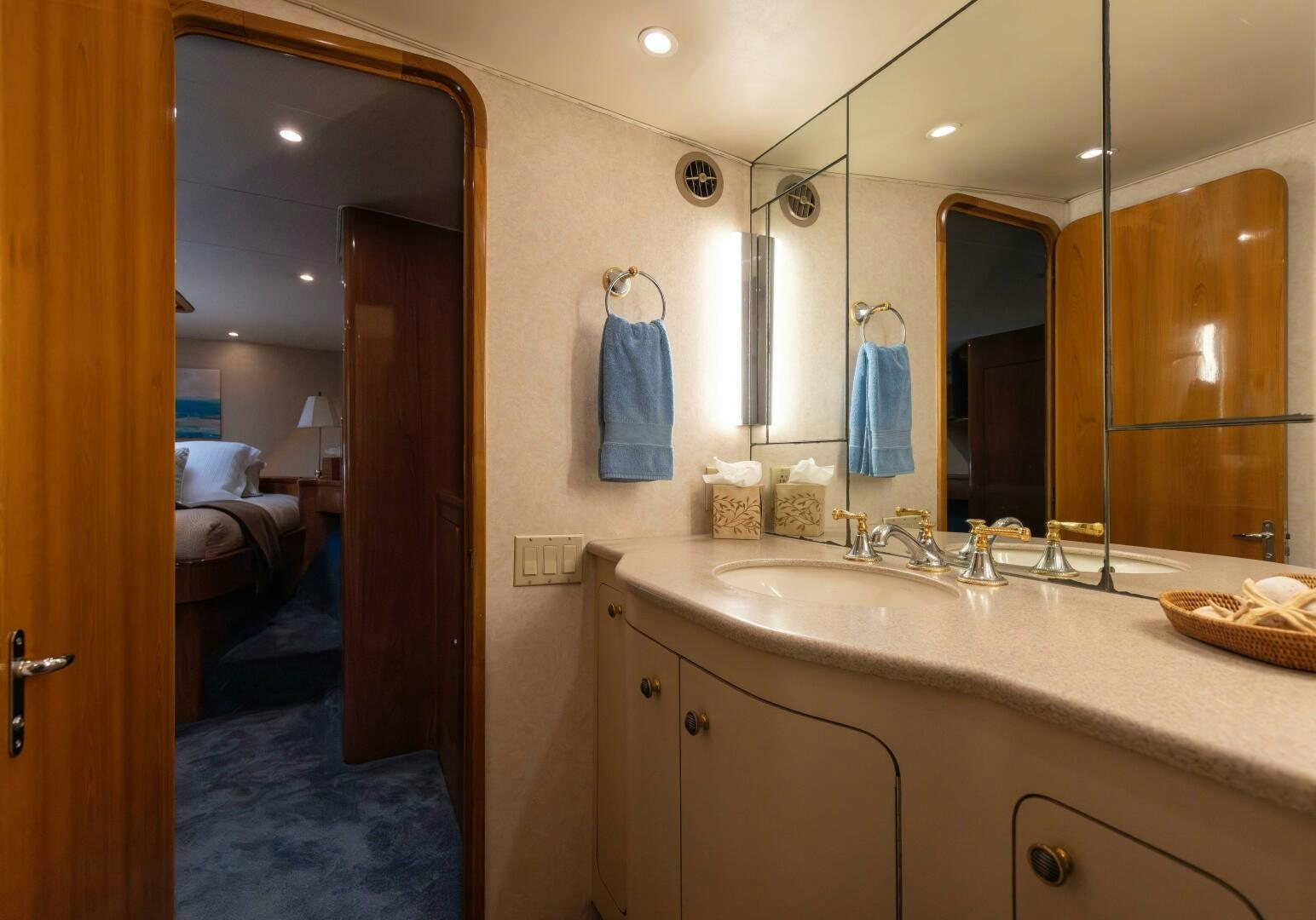 a bathroom with a sink and a mirror aboard DIXIE Yacht for Sale