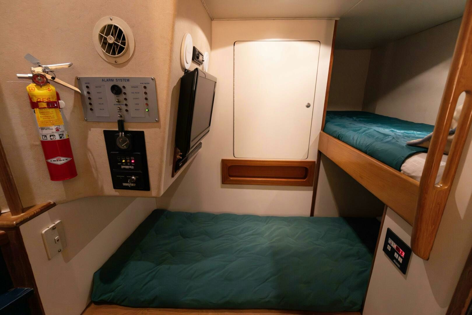 a hospital room with a bed and a desk aboard DIXIE Yacht for Sale