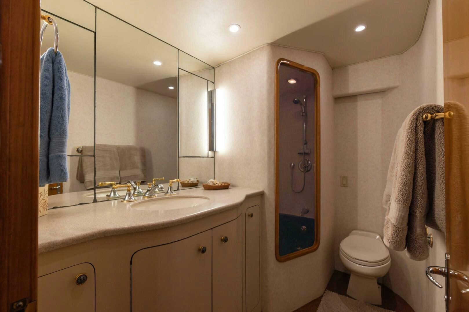 a bathroom with a sink and toilet aboard DIXIE Yacht for Sale