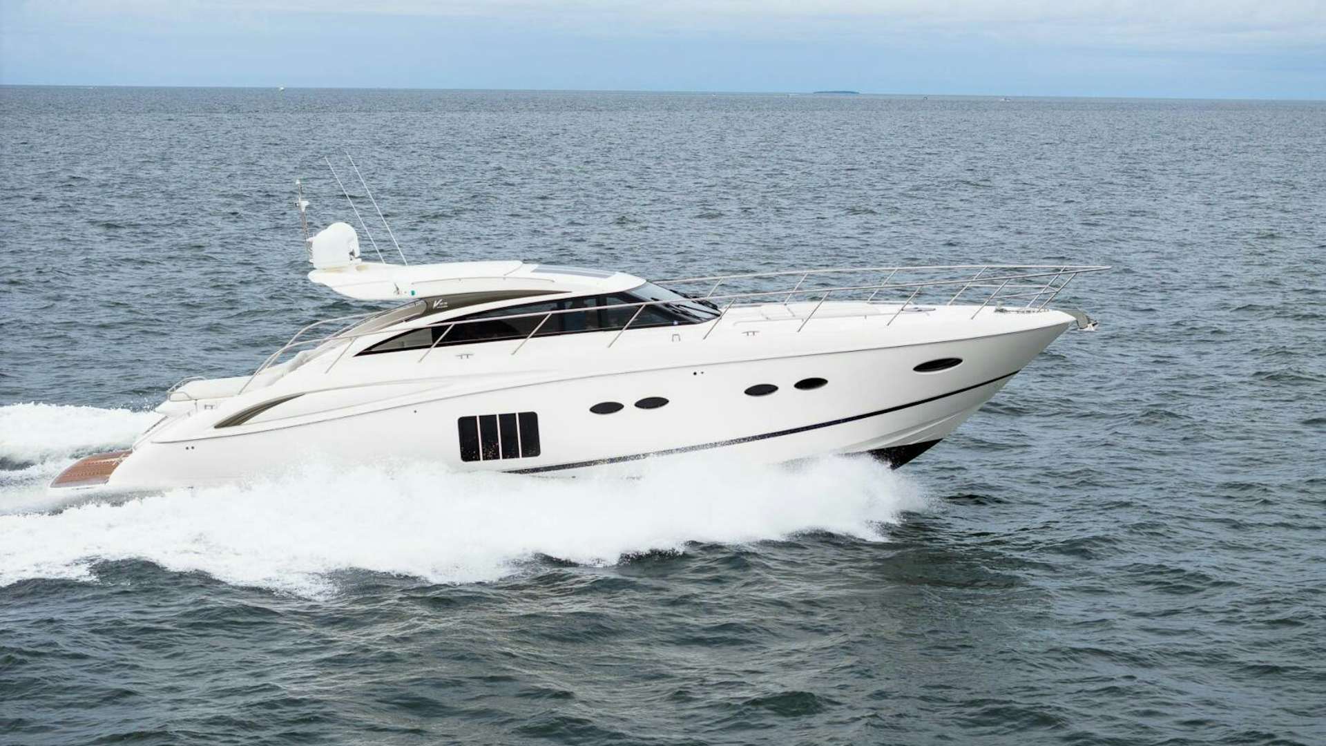 a white yacht in the water aboard ESCAPE PLAN Yacht for Sale