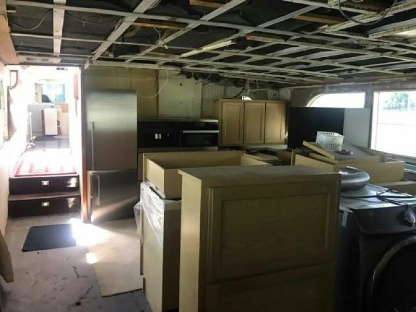 a kitchen with a lot of cabinets aboard SOUTHERN BREEZE Yacht for Sale