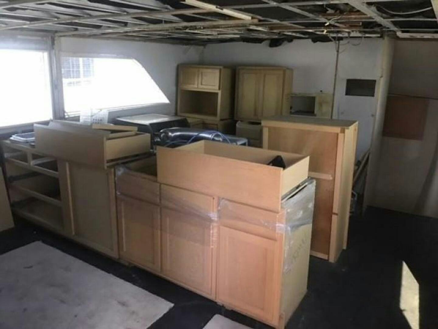a room with many boxes aboard SOUTHERN BREEZE Yacht for Sale