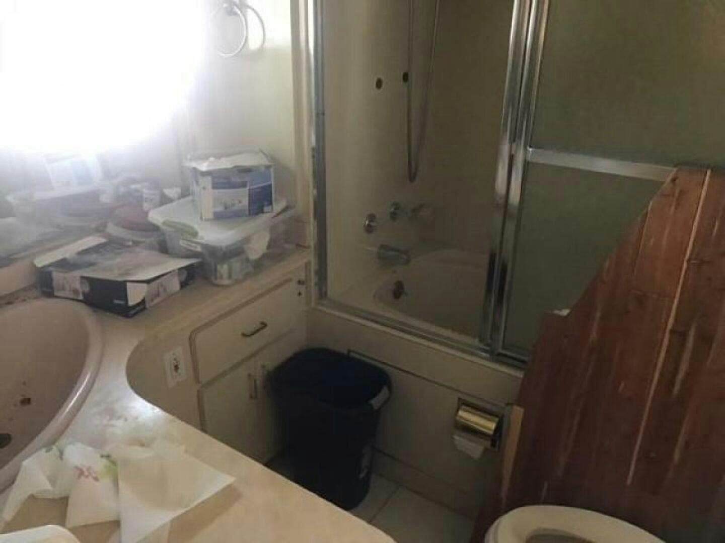 a bathroom with a tub sink and toilet aboard SOUTHERN BREEZE Yacht for Sale