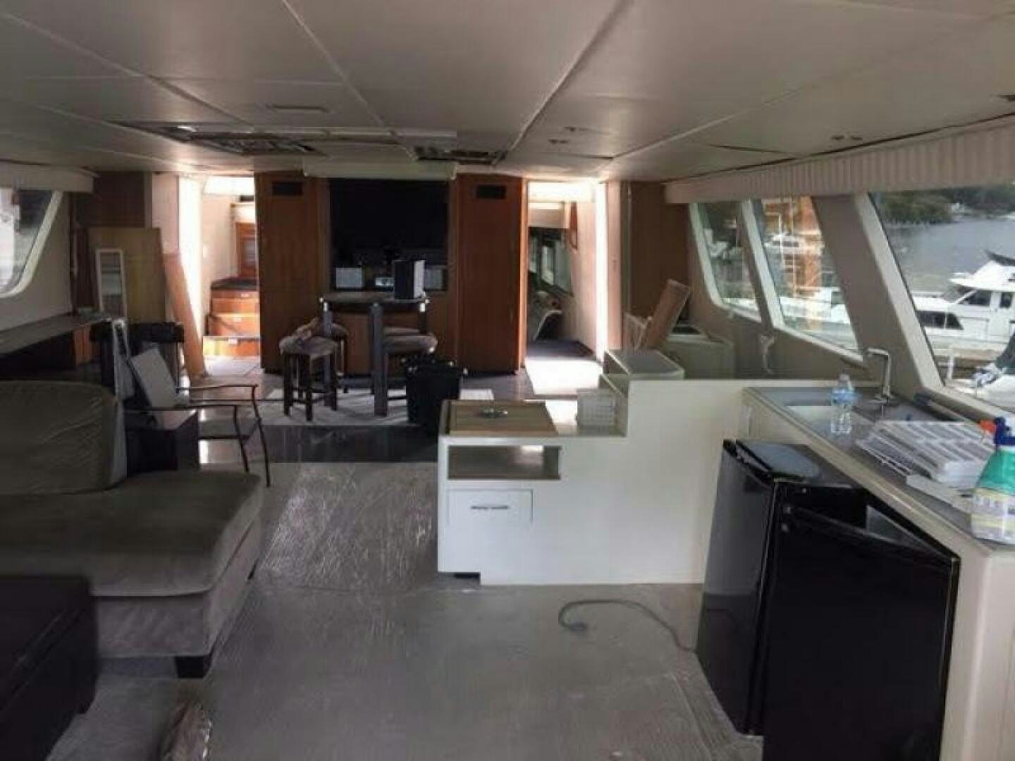 a room with a couch and a desk aboard SOUTHERN BREEZE Yacht for Sale