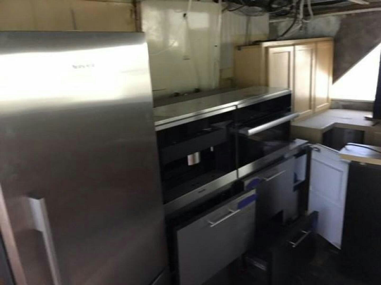 a kitchen with a stove and cabinets aboard SOUTHERN BREEZE Yacht for Sale
