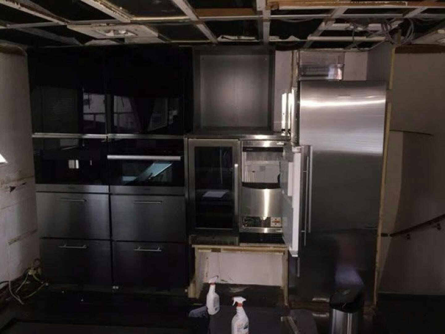 a kitchen with a large refrigerator aboard SOUTHERN BREEZE Yacht for Sale