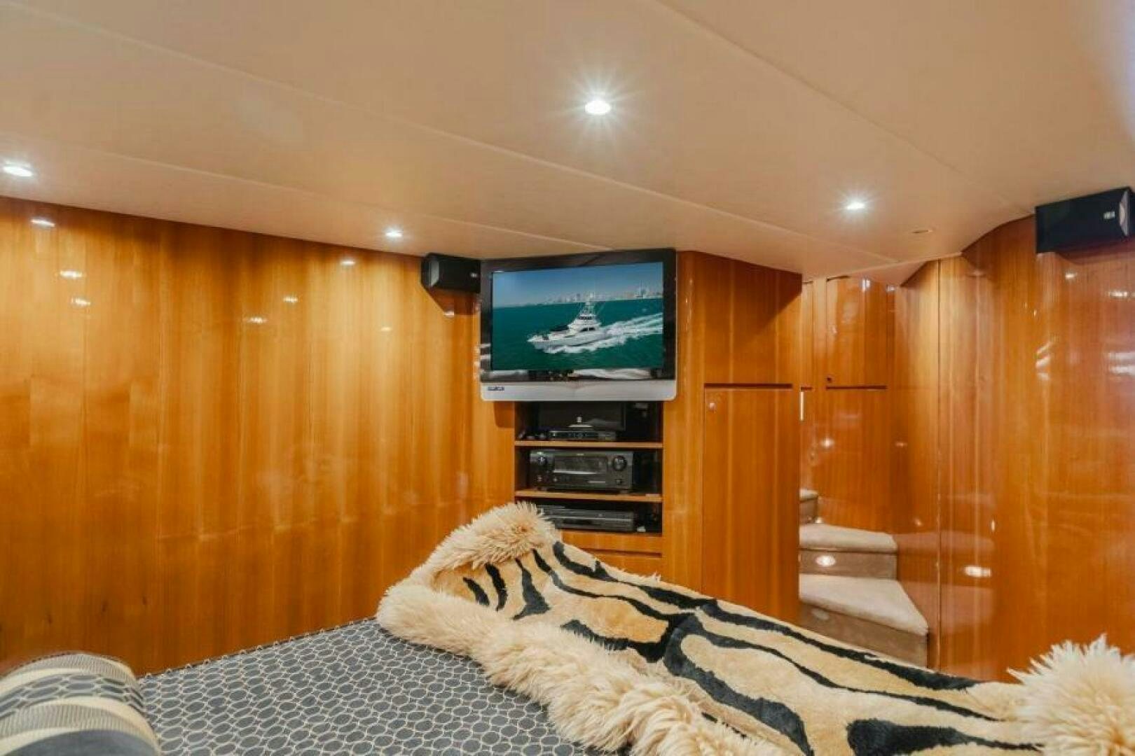 a cat watching tv aboard FAN TAIL I Yacht for Sale