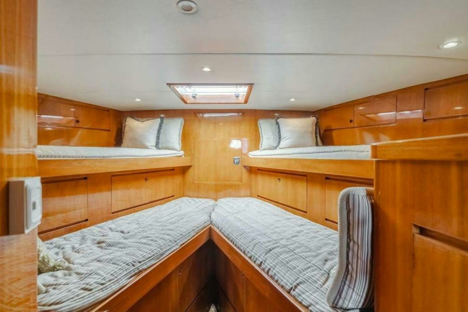 a room with bunk beds aboard FAN TAIL I Yacht for Sale