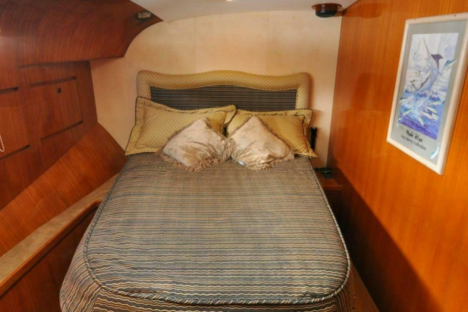 a bed with a pillow aboard FAN TAIL I Yacht for Sale