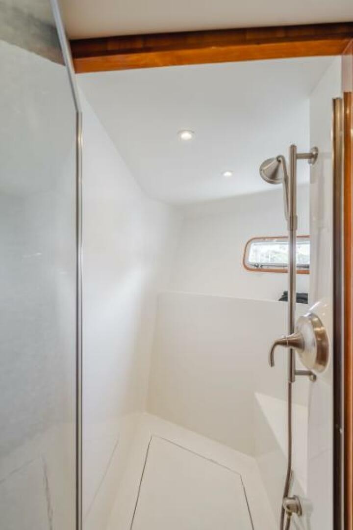 a shower unit in a bathroom aboard FAN TAIL I Yacht for Sale
