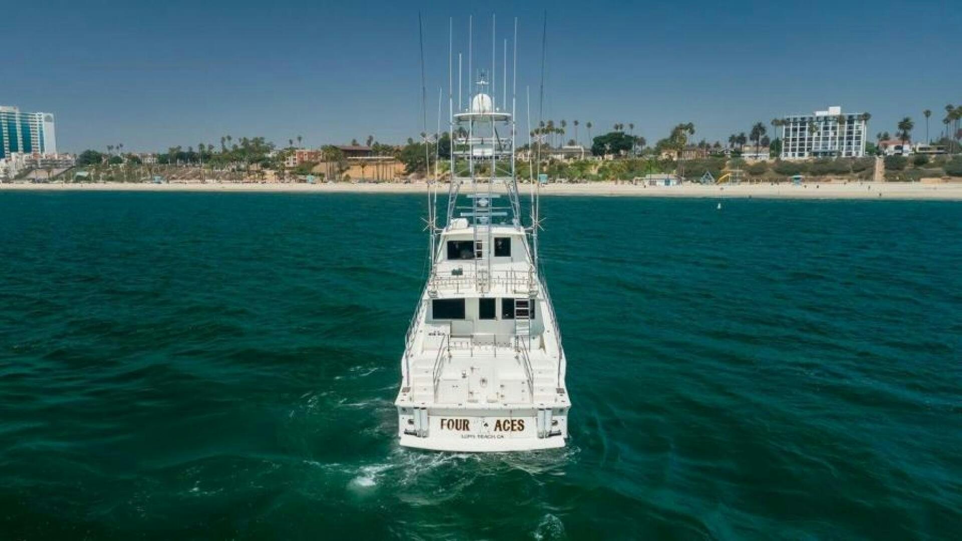 a white boat in the water aboard FAN TAIL I Yacht for Sale
