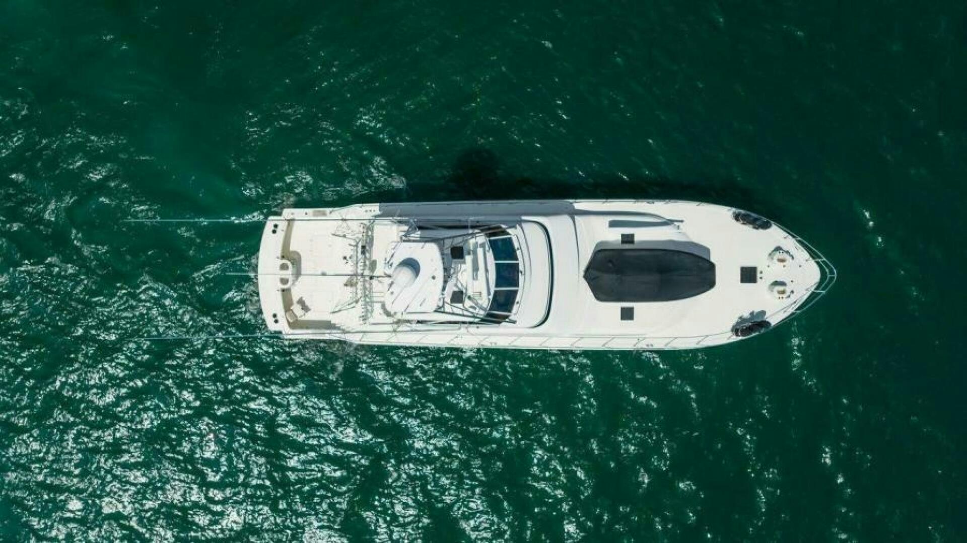 a car on a road aboard FAN TAIL I Yacht for Sale