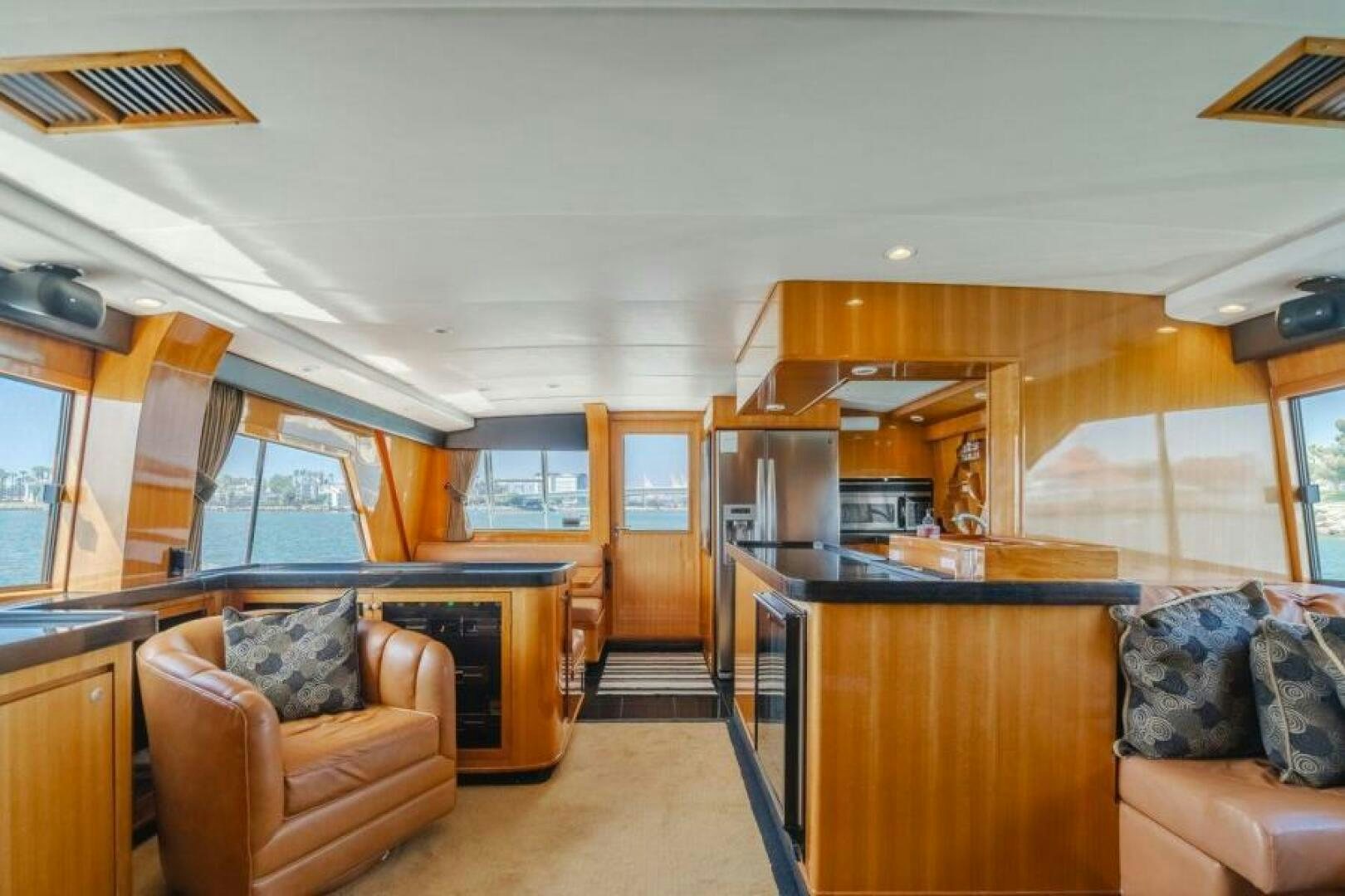 a living room with a couch and a tv aboard FAN TAIL I Yacht for Sale