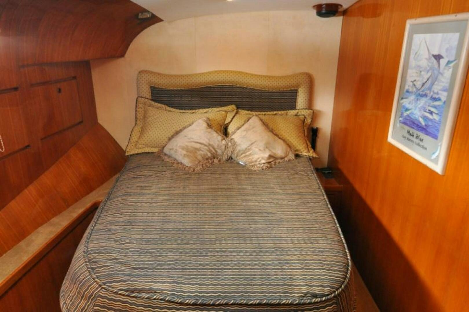 a bed with a pillow aboard FAN TAIL I Yacht for Sale