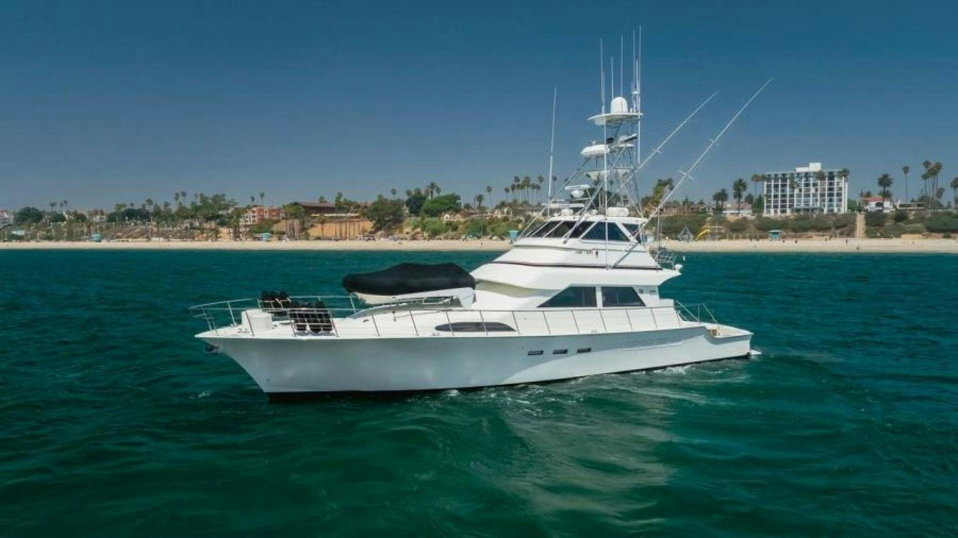a white boat in the water aboard FAN TAIL I Yacht for Sale