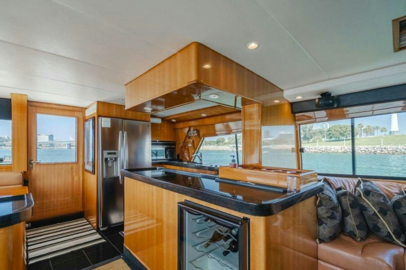 a kitchen and living room aboard FAN TAIL I Yacht for Sale