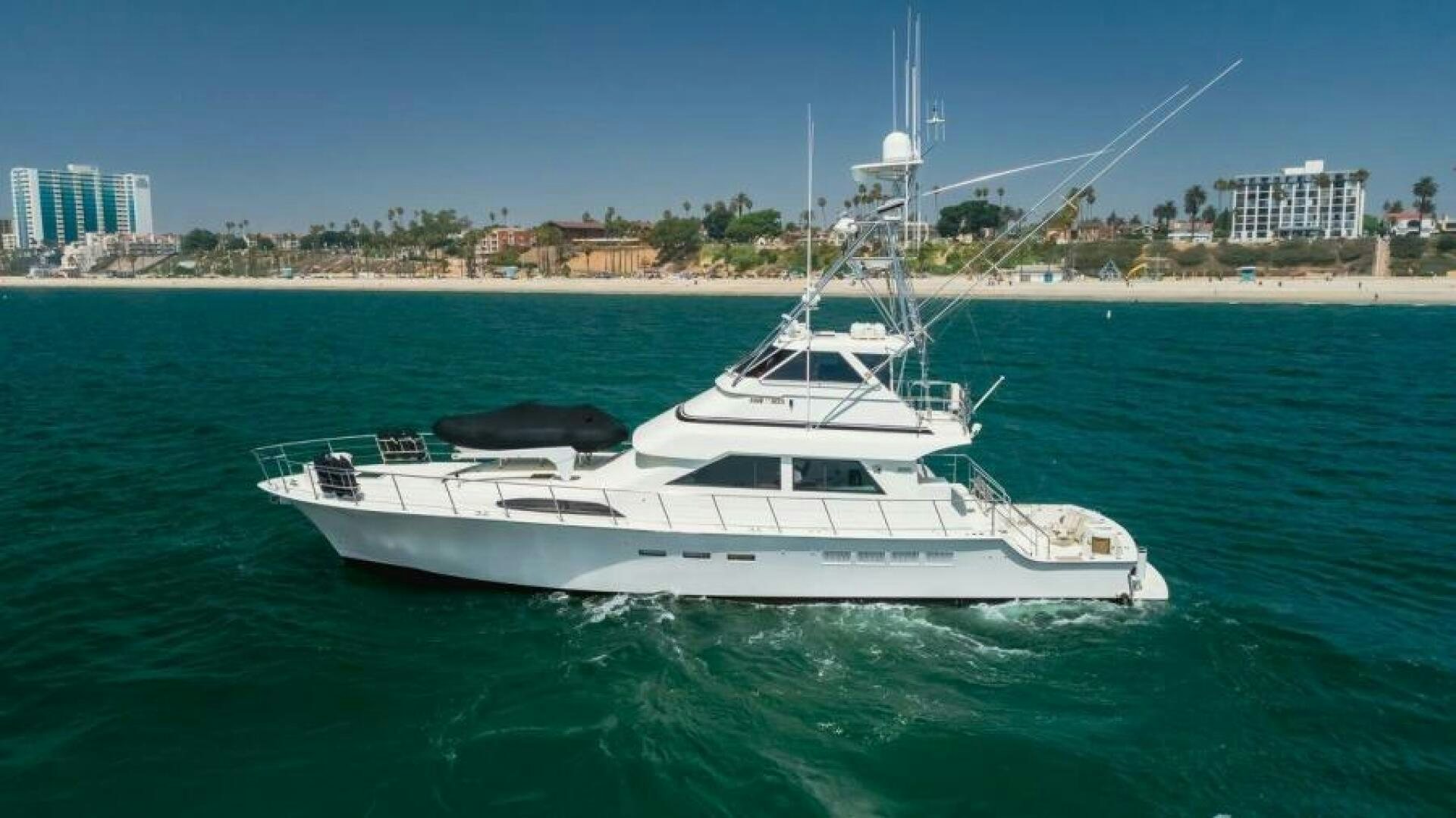 a white boat on the water aboard FAN TAIL I Yacht for Sale