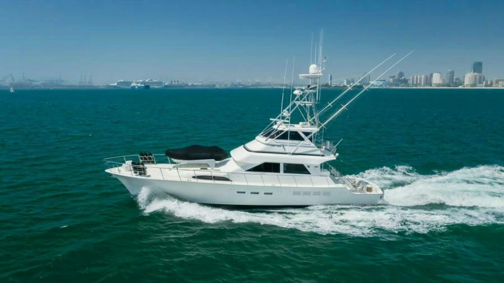 a white yacht in the ocean aboard FAN TAIL I Yacht for Sale