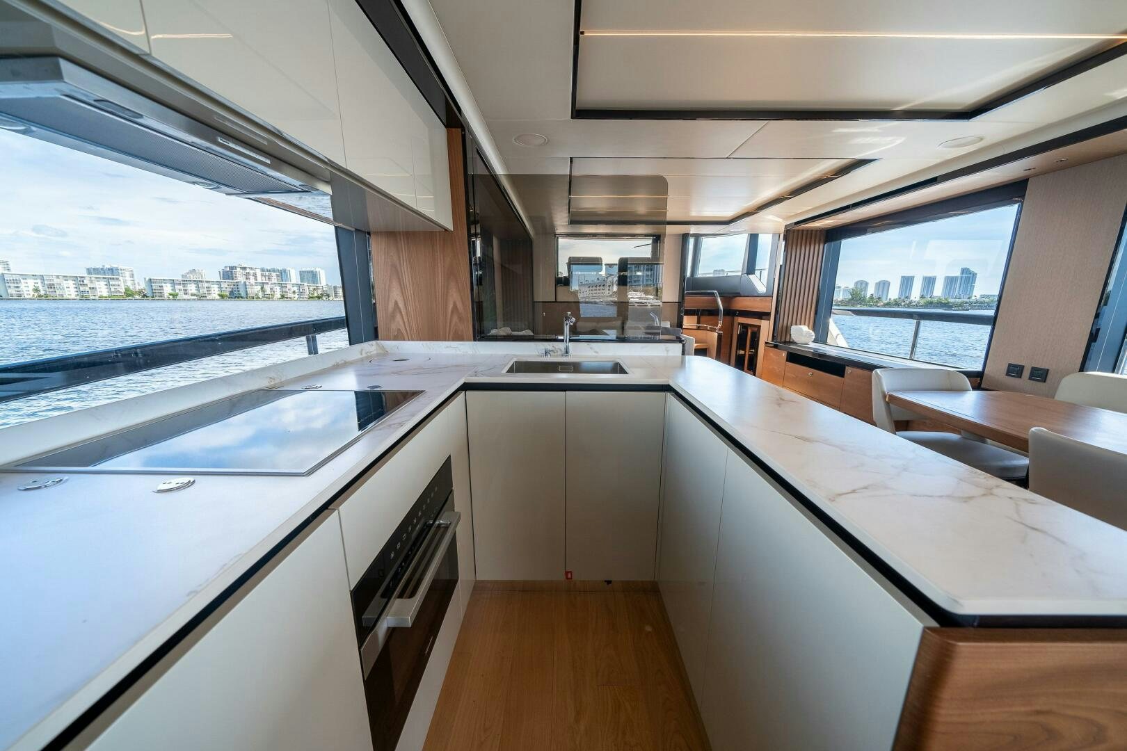 a kitchen with a large window aboard ALGI Yacht for Sale