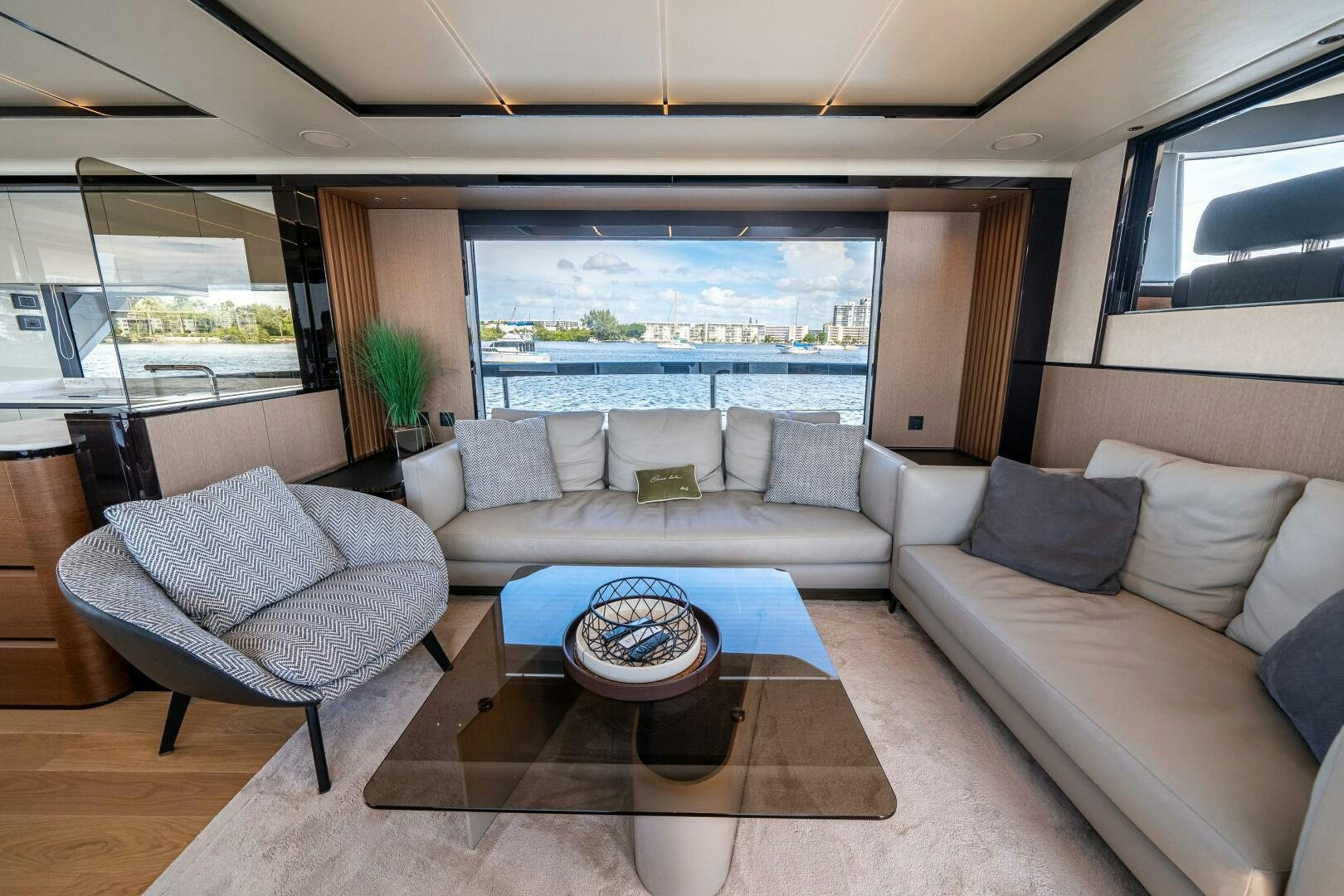 a living room with a large window aboard ALGI Yacht for Sale