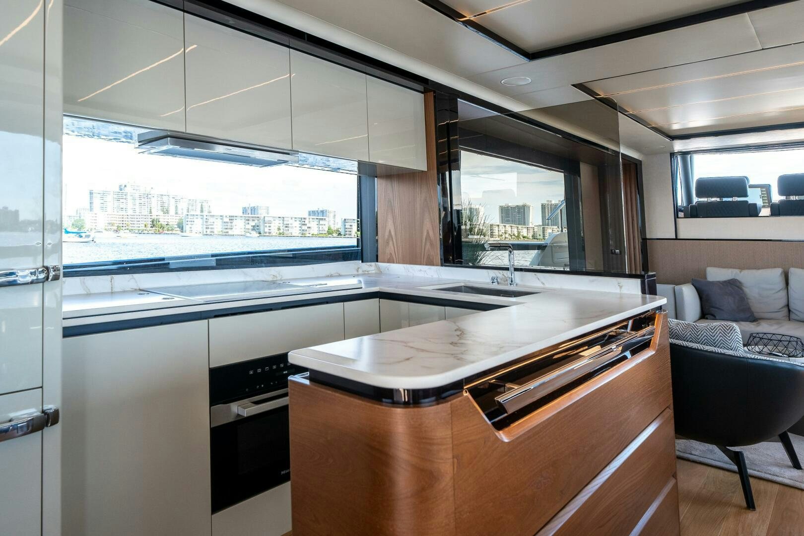 a kitchen with a glass wall aboard ALGI Yacht for Sale