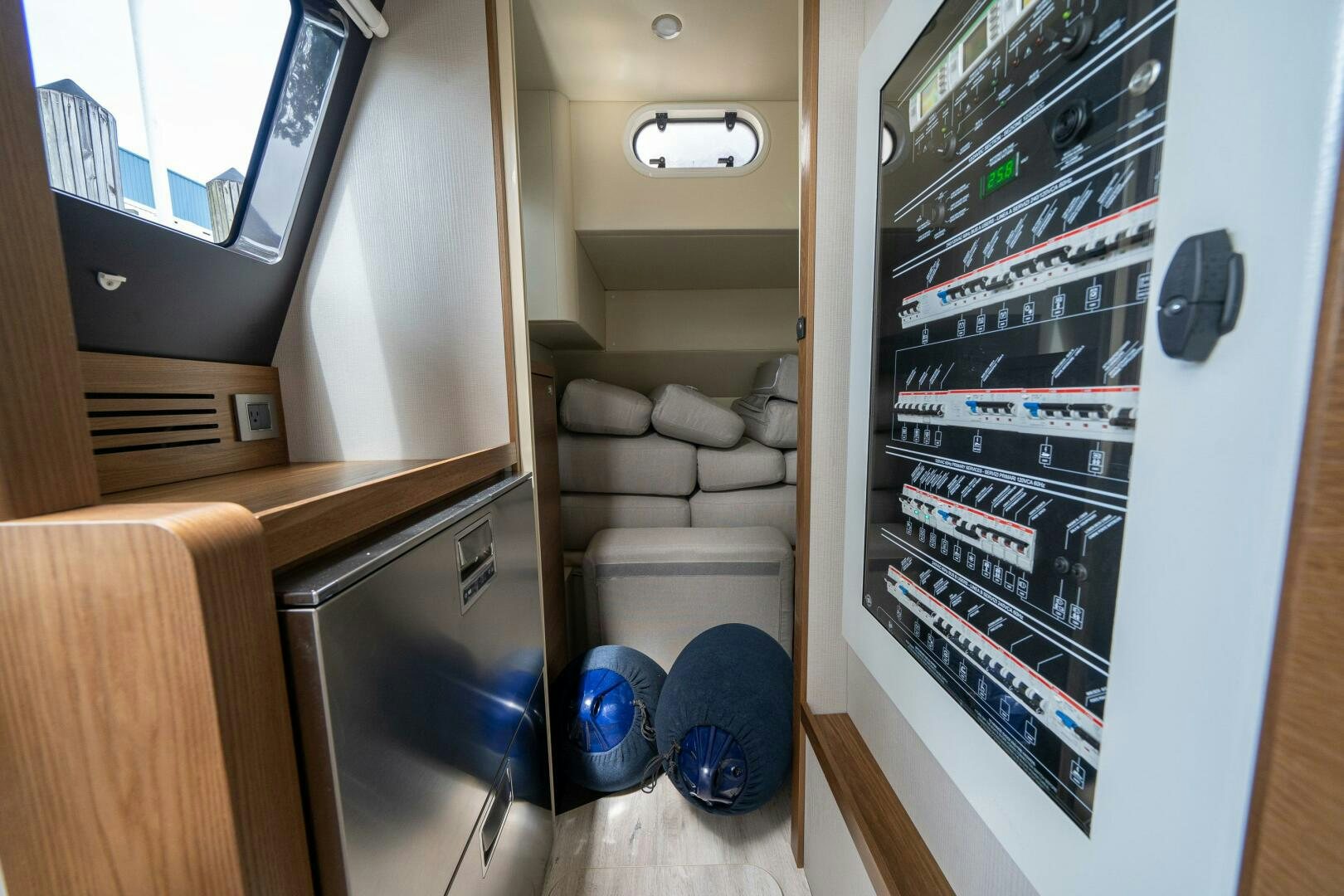 a room with a bunk bed and a television aboard ALGI Yacht for Sale