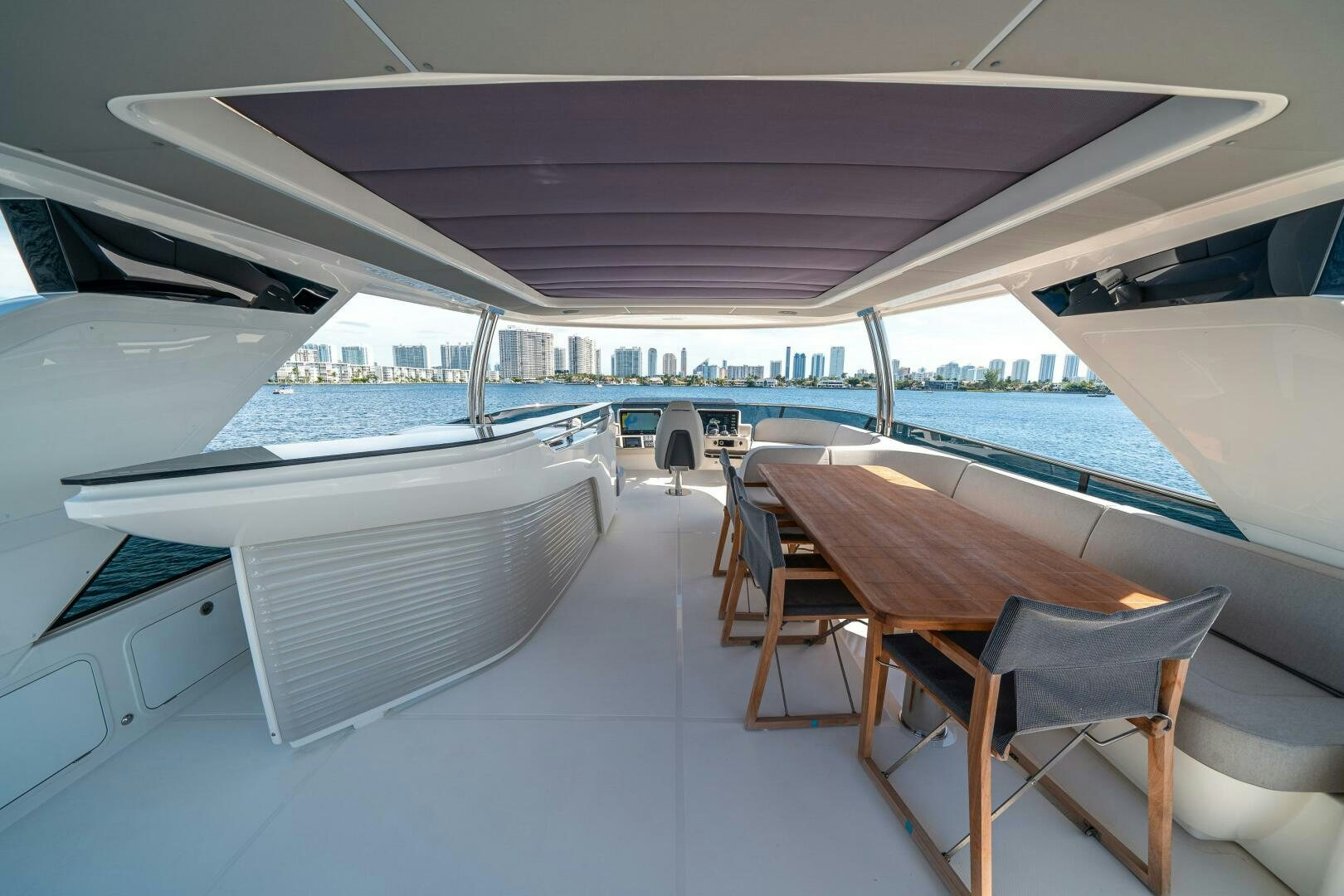 a room with a table and chairs on it aboard ALGI Yacht for Sale