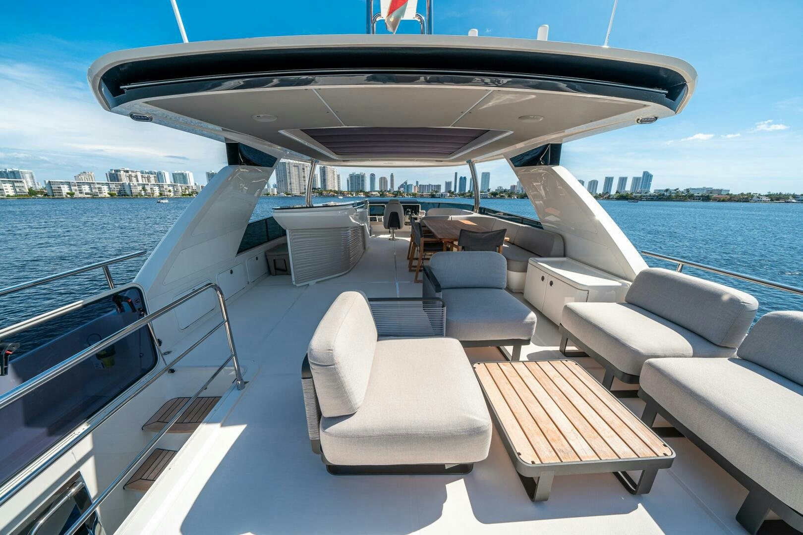 a boat with chairs on the deck aboard ALGI Yacht for Sale