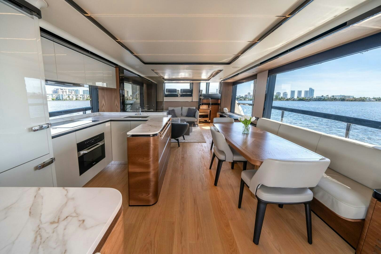 a kitchen and dining area aboard ALGI Yacht for Sale