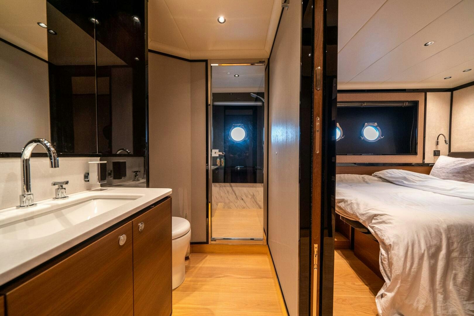 a bathroom with a bed and a sink aboard ALGI Yacht for Sale