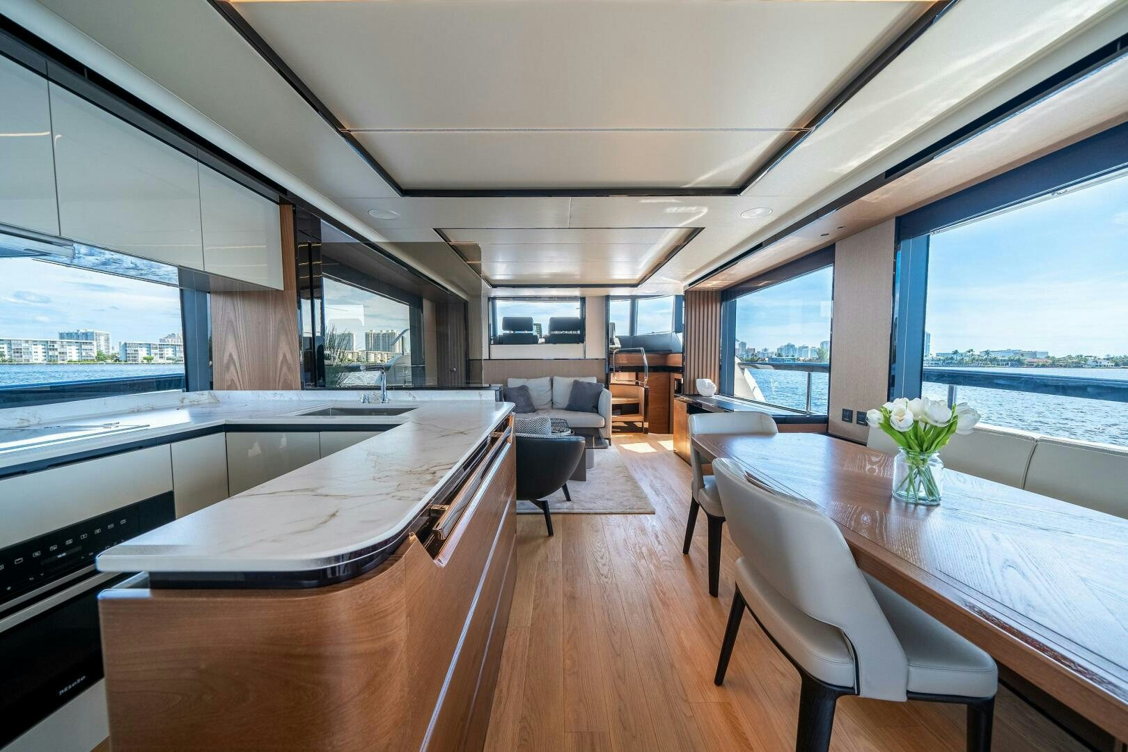 a room with a table and chairs aboard ALGI Yacht for Sale