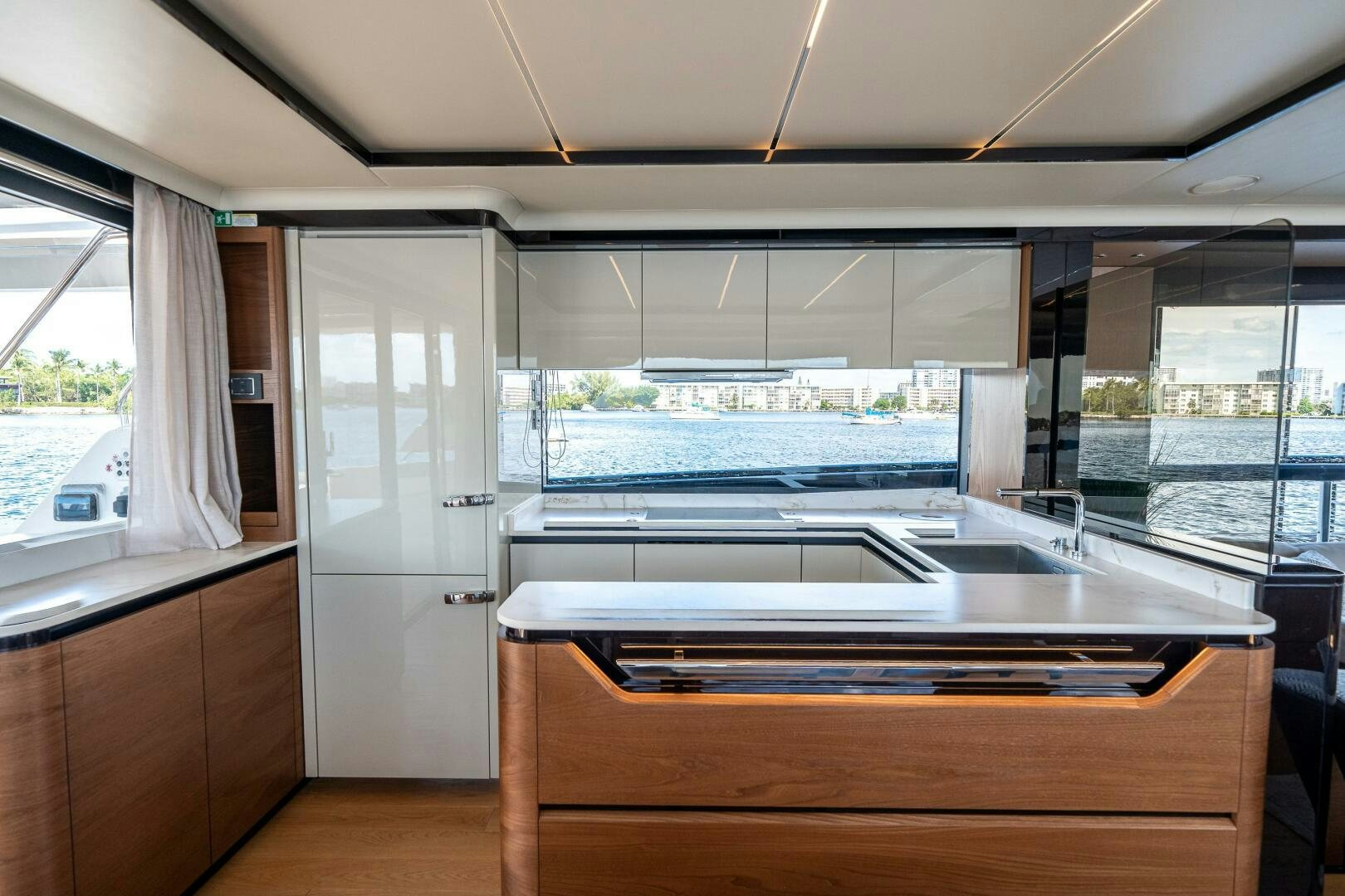 a kitchen with a large window aboard ALGI Yacht for Sale
