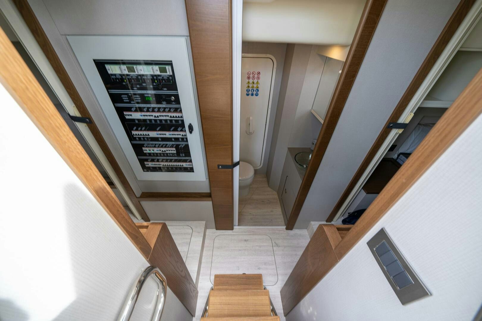 a bathroom with a large white wall aboard ALGI Yacht for Sale