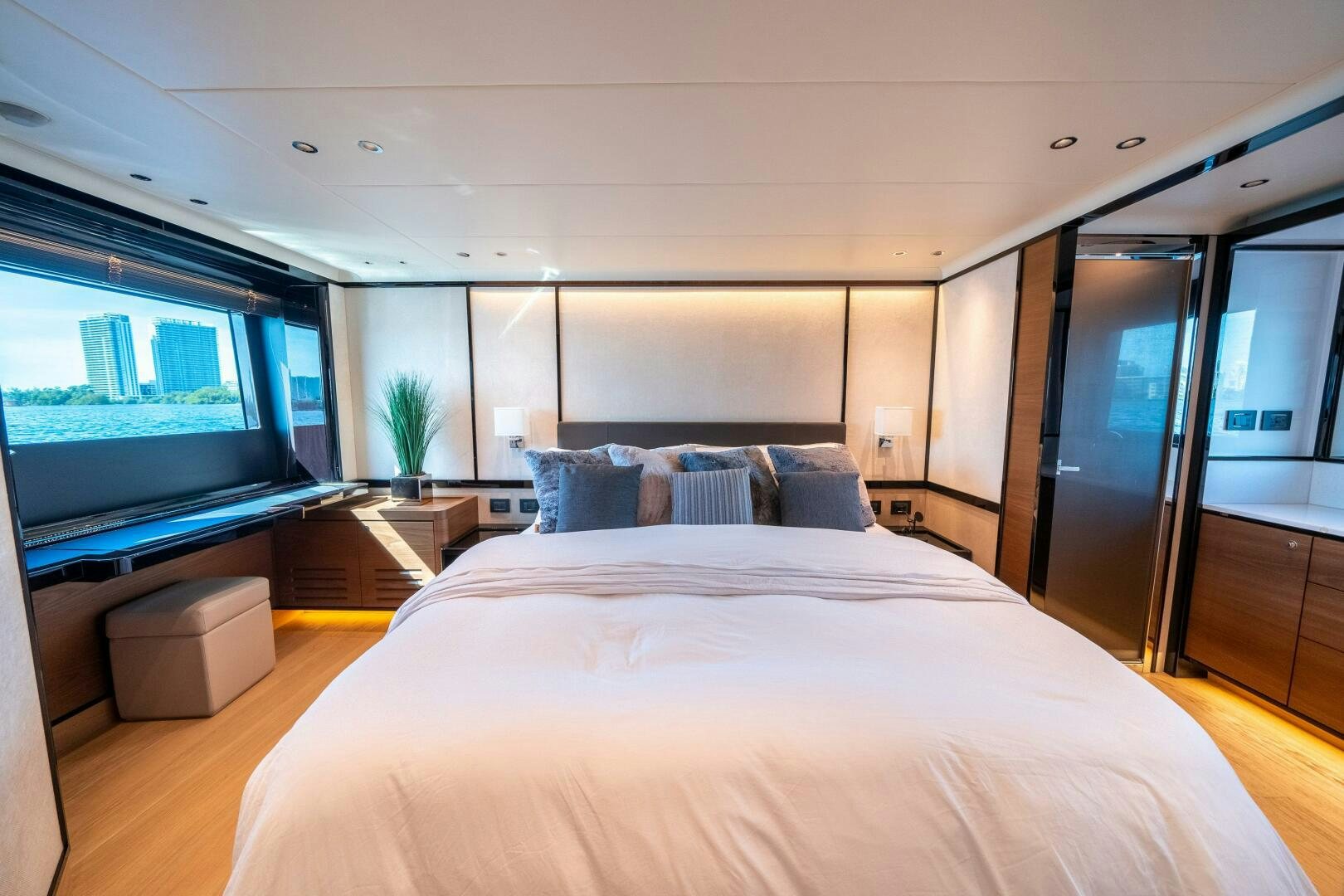 a large bed in a room aboard ALGI Yacht for Sale