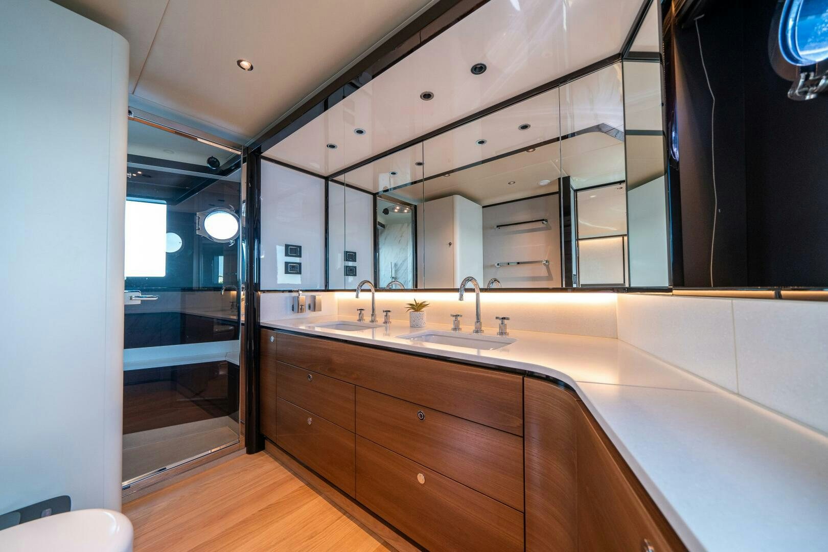 a bathroom with a sink and a mirror aboard ALGI Yacht for Sale