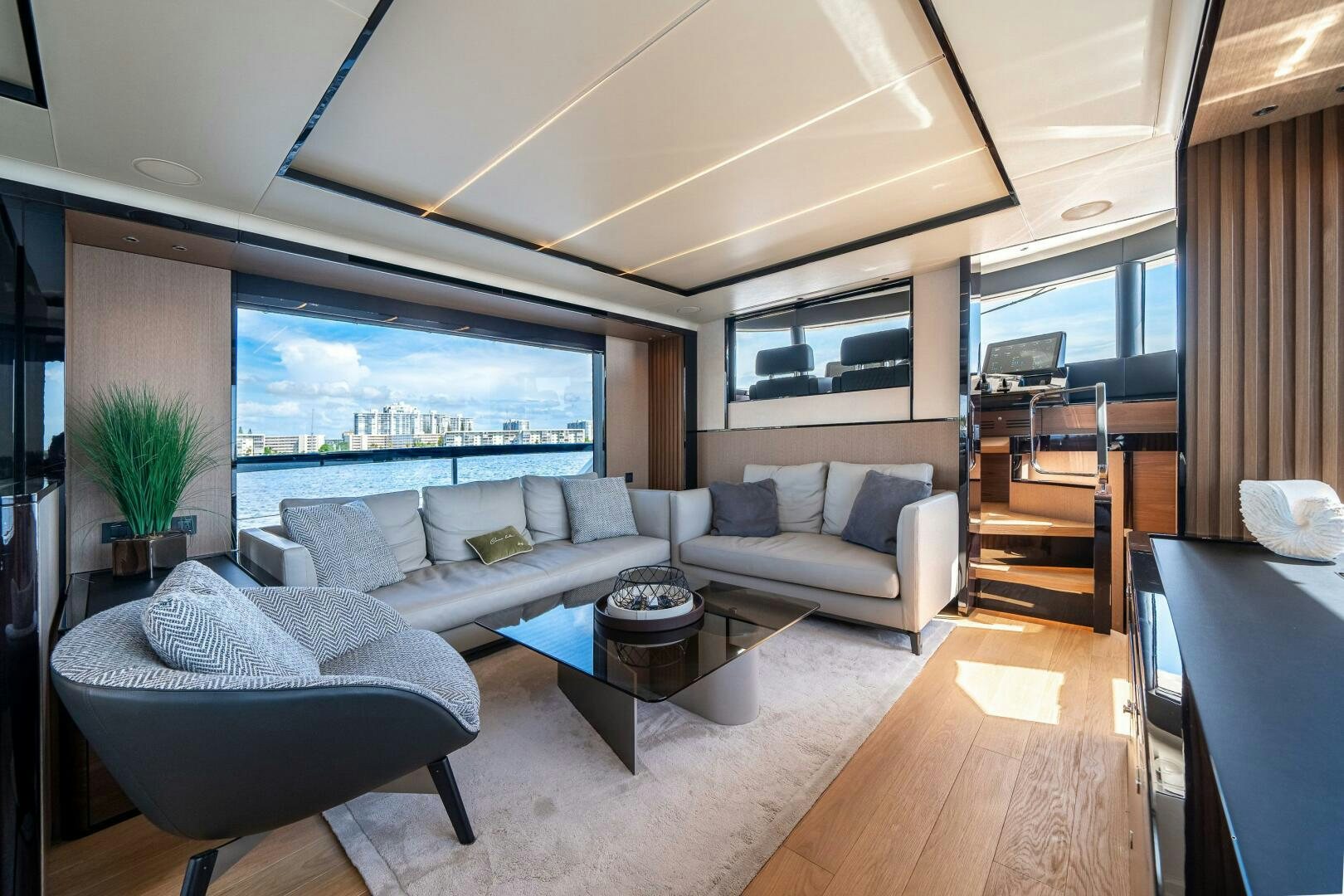 a living room with a large window aboard ALGI Yacht for Sale