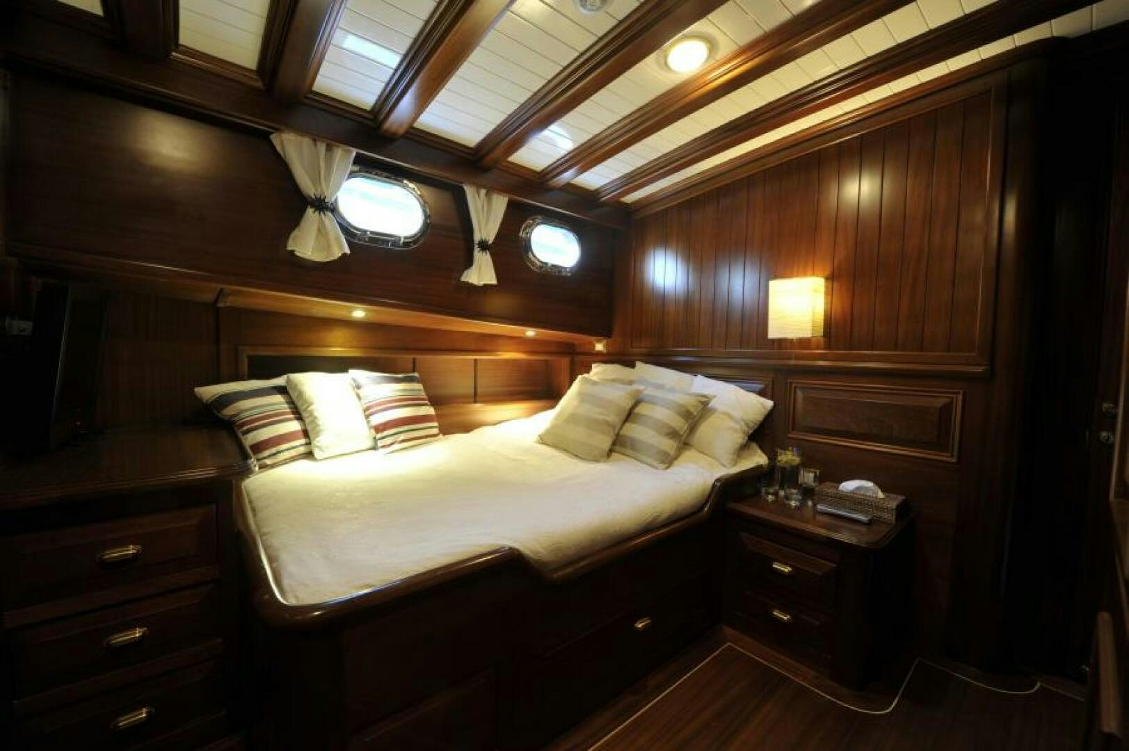 a bed in a room aboard CLARISSA Yacht for Sale