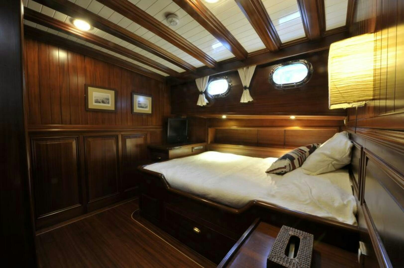 a bed in a room aboard CLARISSA Yacht for Sale